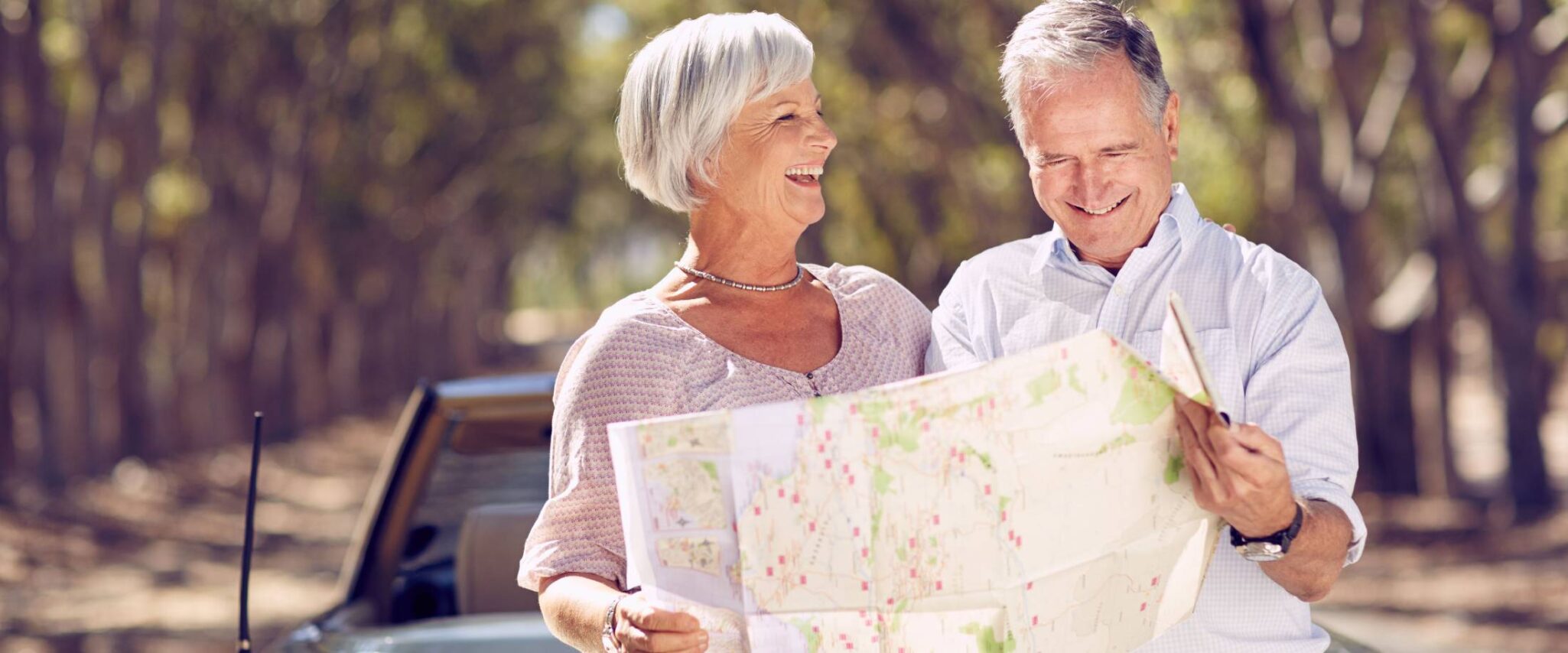 Senior couple looking at map