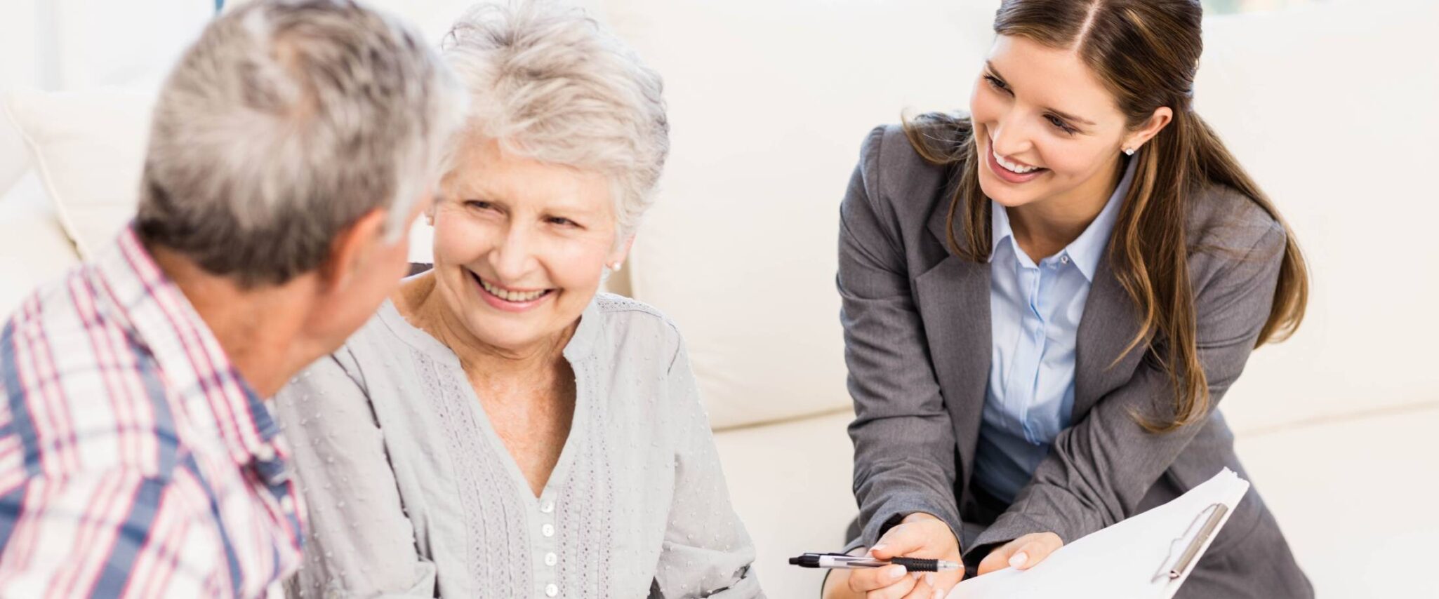 Senior couple talking to financial advisor