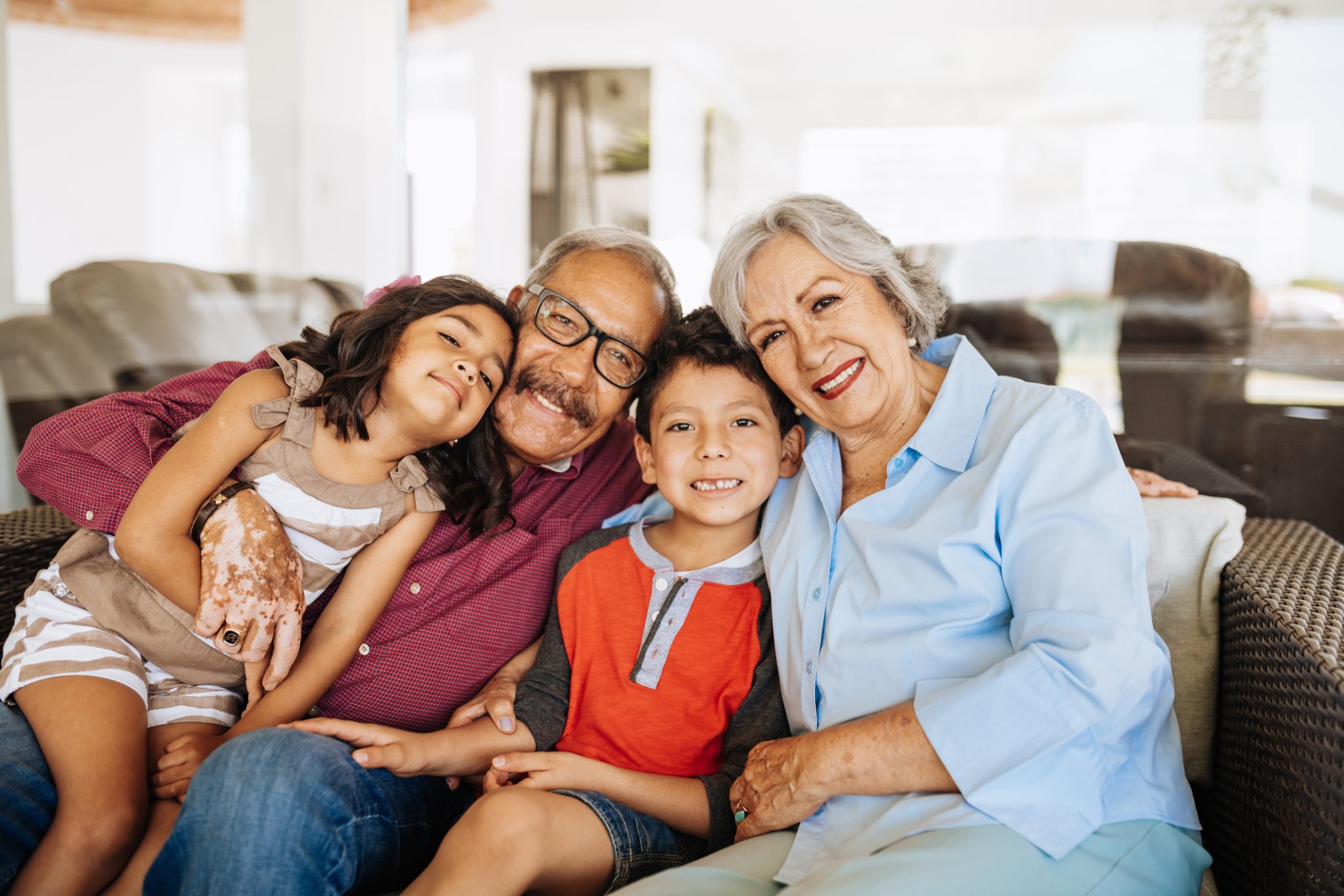 Smiling grandparents with grandkids